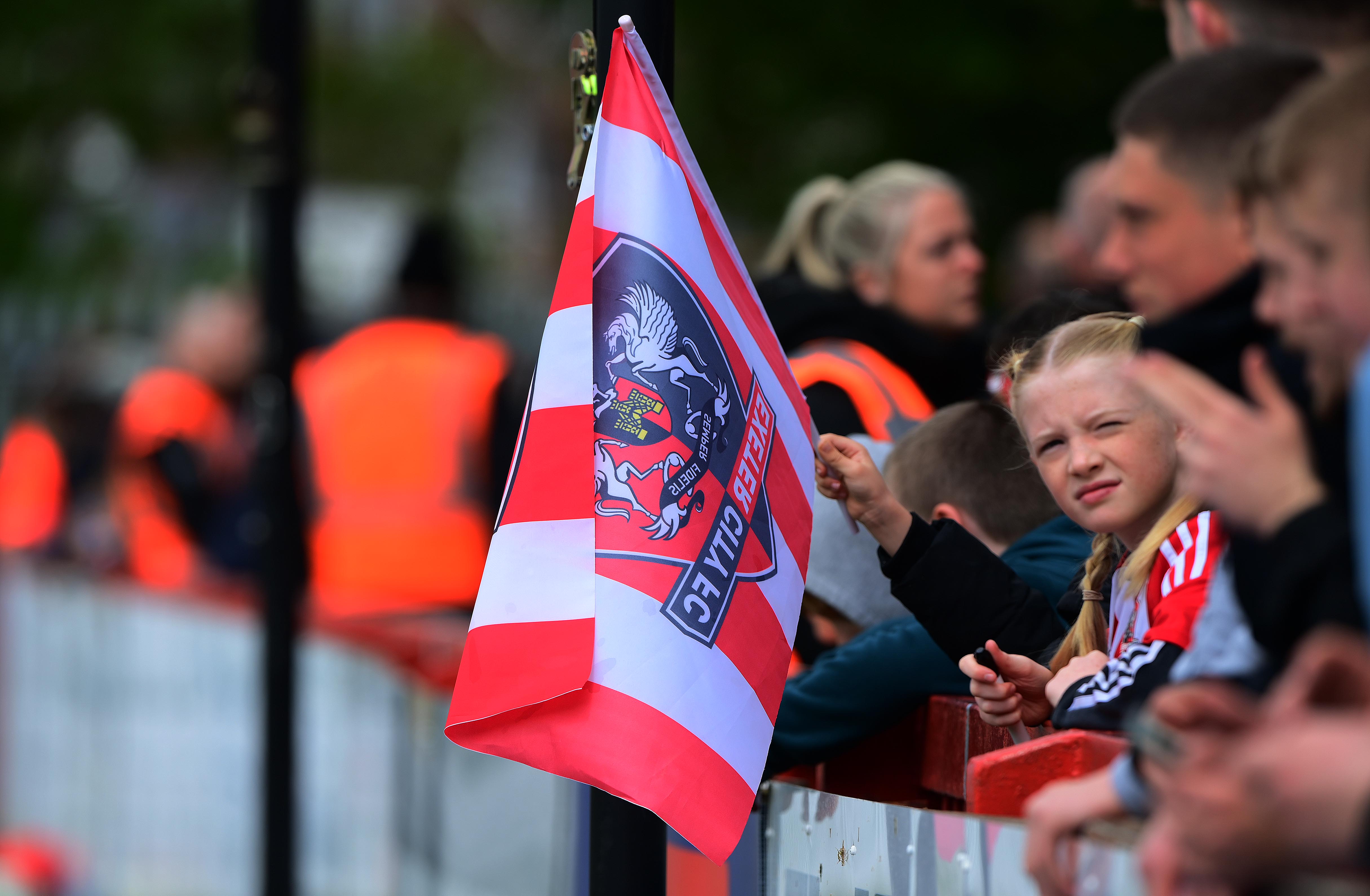 Exeter City fan waving a flag