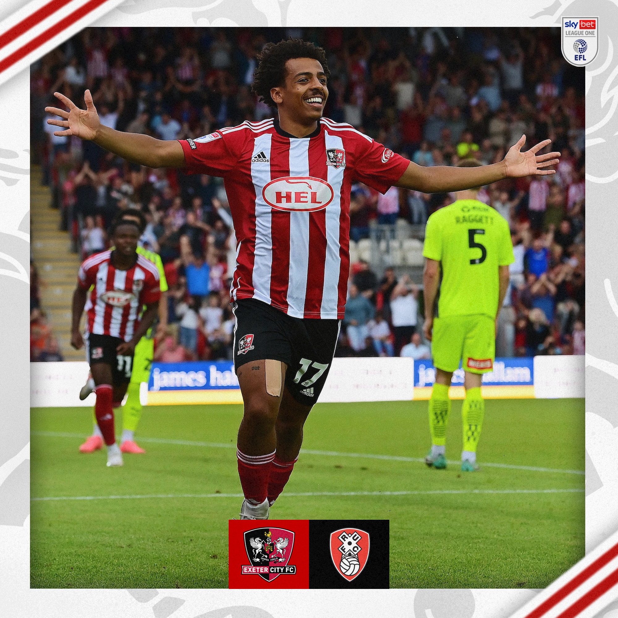 Caleb Watts, in Exeter City's red and white, celebrating his goal with his arms stretched out.