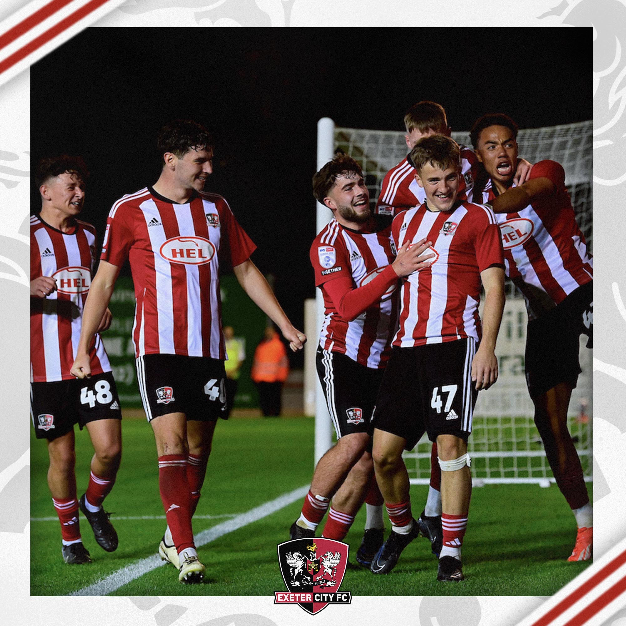 Image of several academy graduates celebrating Jake Richards' goal in the EFL Trophy. Visible (left to right) Louie Cayless, Ed James, Theo Cutler, Kieran Wilson, Jake Richards, Pedro Borges.